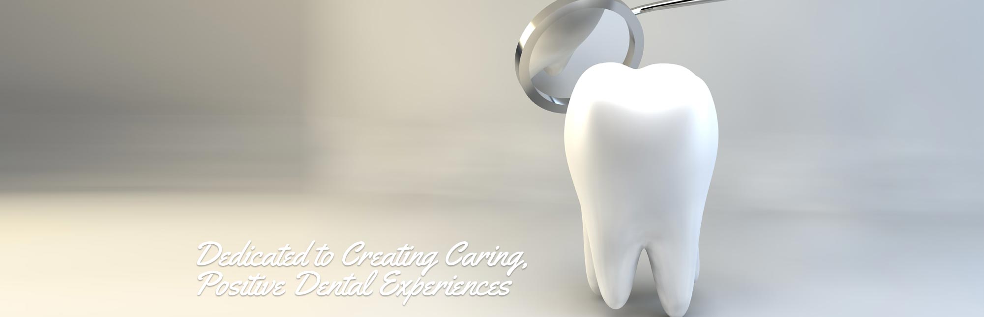 White Tooth with Dental Mirror - Dedicated to Creating Caring, Positive Dental Experiences