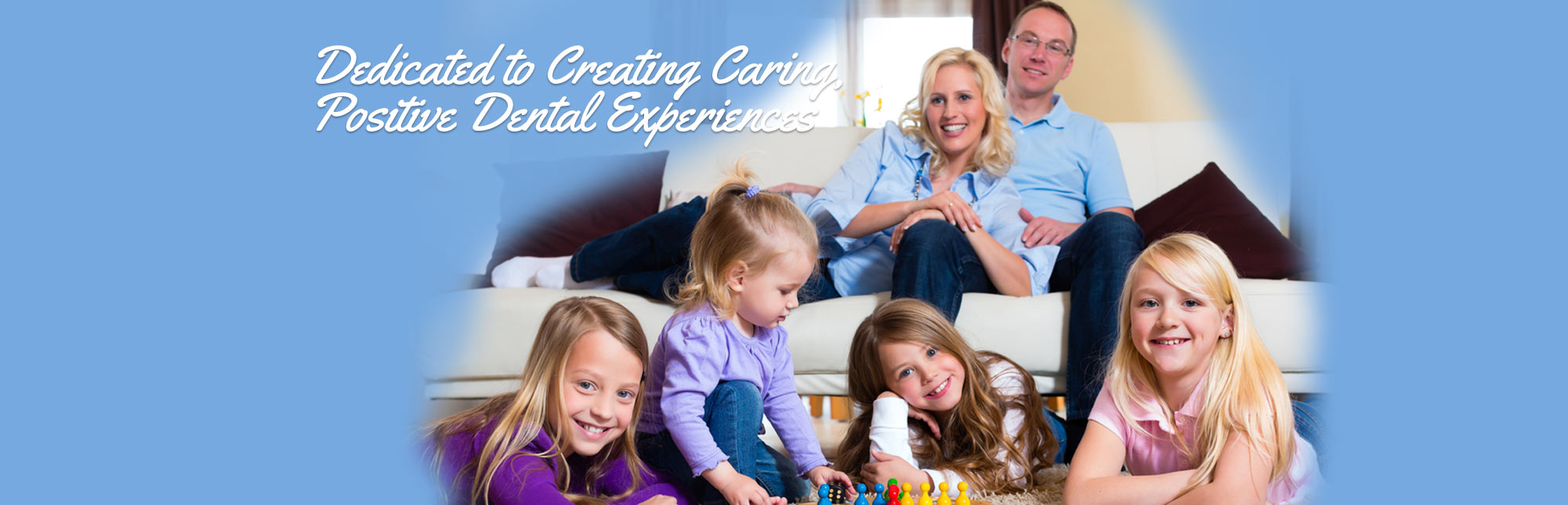 Young Couple with little children - Dedicated to Creating Caring, Positive Dental Experiences